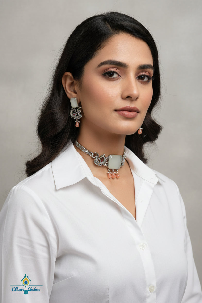 Model showcasing the Raiza German silver choker set with elegant earrings, highlighting intricate craftsmanship.