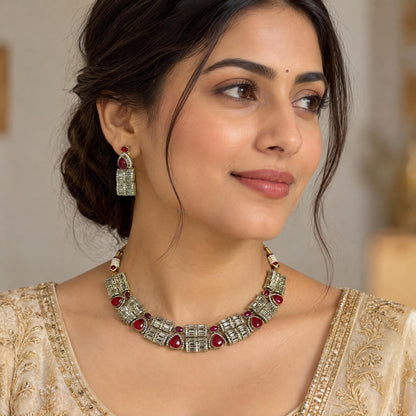 Indian woman wearing the Sufiya American diamond necklace set with a festive gold-trimmed kurta.